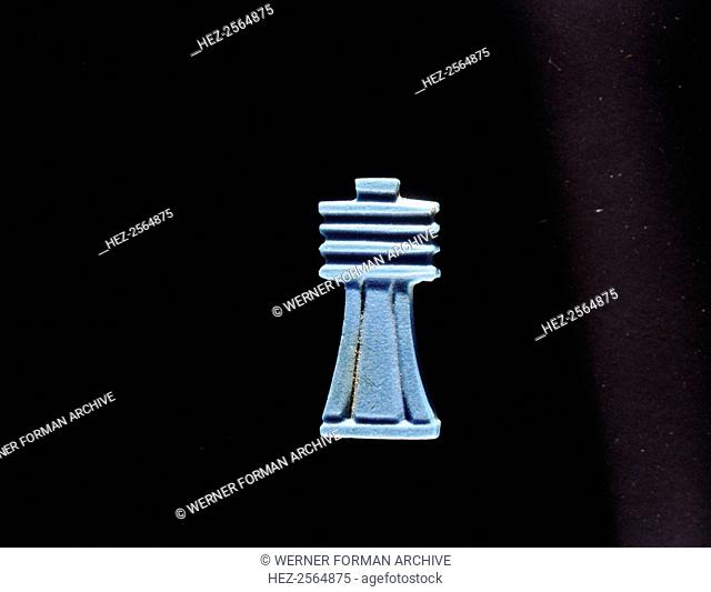 Blue glass furniture inlay depicting a djed(stability)pillar which by the New Kingdom was regarded as a symbol of Osiris