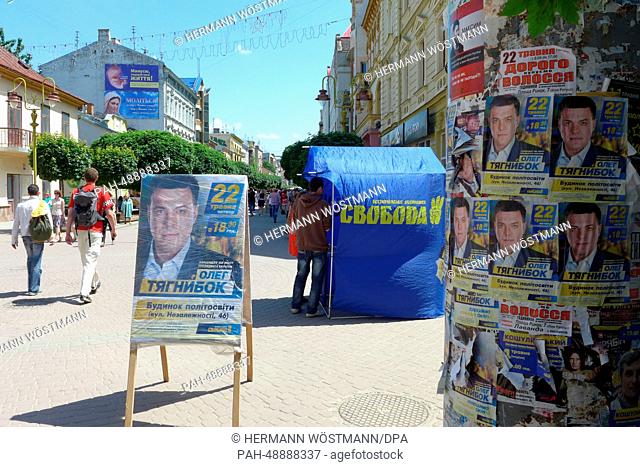 Election posters in the pedestrian zone in Ivano-Frankivsk, Ukraine, 22 May 2014. Photo: Hermann Woestmann/dpa | usage worldwide