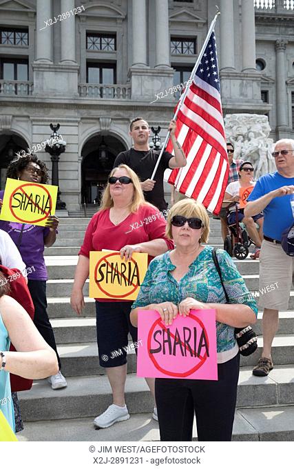 Harrisburg, Pennsylvania USA - 10 June 2017 - About 50 members of ACT for America rallied on the steps of the Pennsylvania state capitol against Sharia law