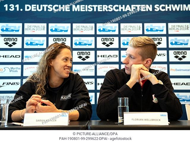 01 August 2019, Berlin: Swimming: German Championship: Florian Wellbrock and his girlfriend Sarah Köhler take part in a press conference