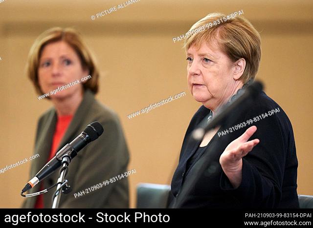03 September 2021, Rhineland-Palatinate, Ringen: German Chancellor Angela Merkel (CDU, r) and Rhineland-Palatinate's Prime Minister Malu Dreyer (SPD) speak at a...