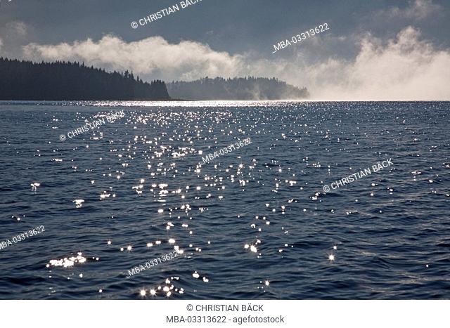 View from the east shore on the fog over Lake Walchensee, Bavaria, Germany