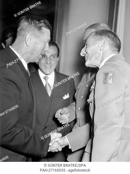 The new French town major of Berlin General Pierre Manceaux-Demiau (r) welcomes the commissioner of the Soviet control commission of Berlin S.A