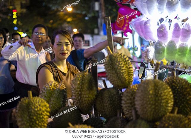 Street vendor selling durians in Nha Trang, Vietnam