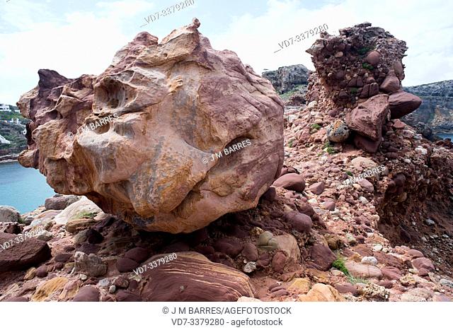 Miocene conglomerate with sandstone pebbles. This photo was taken in Cala Morell, Menorca Island, Balearic Islands, Spain