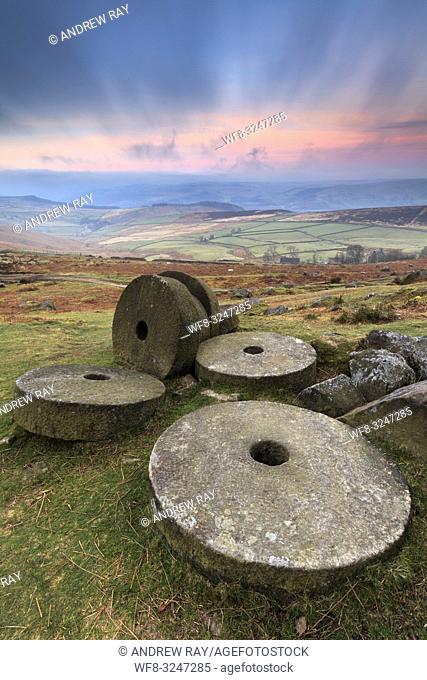 The abandoned millstones on Stanage Edge in the Peak District National Park captured at sunrise in late March. A long shutter speed was utilised to blur the...