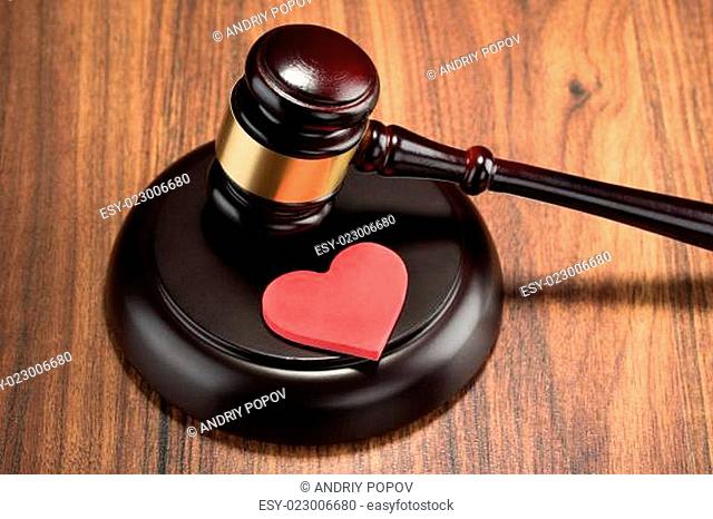 Gavel And Red Heart On Table