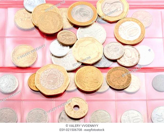 numismatics album with different coins