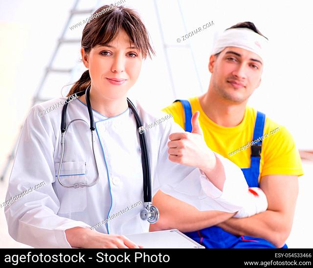 The worker with injured head and doctor