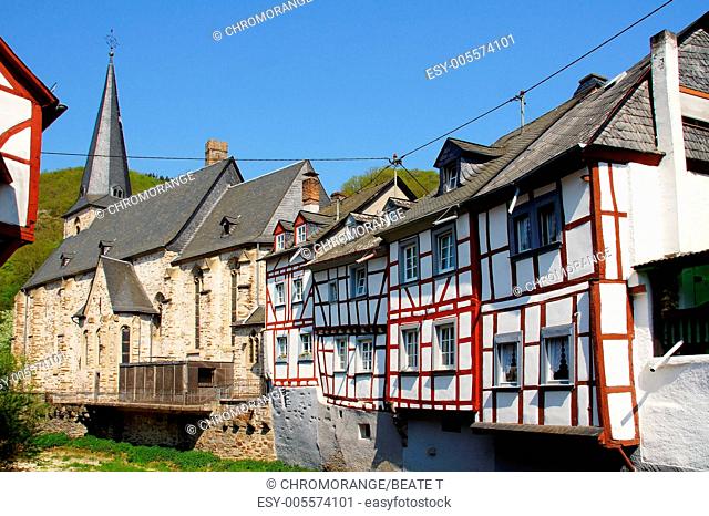 Church and half-timbered houses in Monreal in the Eifel mountains