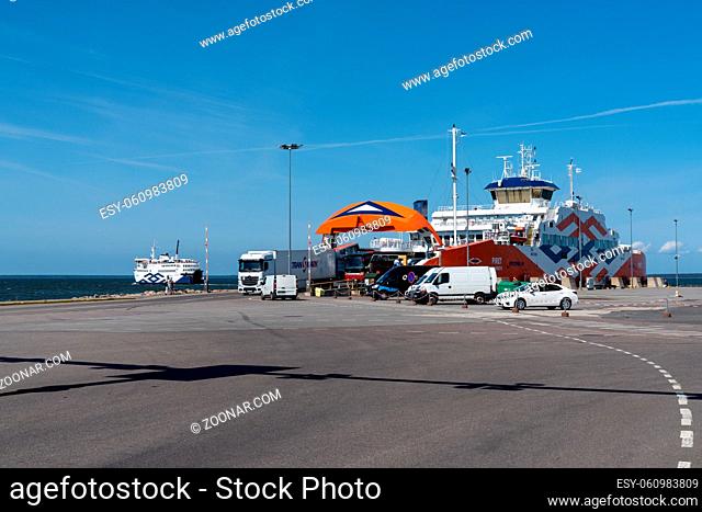 Virtsu, Estonia - 13 August, 2021: ferry unloading passengers and cars in the harbor of Virtsu
