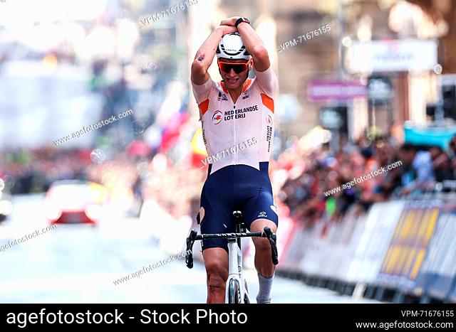 Dutch Mathieu van der Poel celebrates as he crosses the finish line to win the men elite road race at the UCI World Championships Cycling, 271