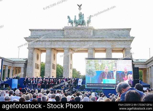 12 September 2023, Berlin: Nikola Eterovic (back l), Apostolic Nuncio in Germany, speaks in front of the Brandenburg Gate at the closing rally of the...