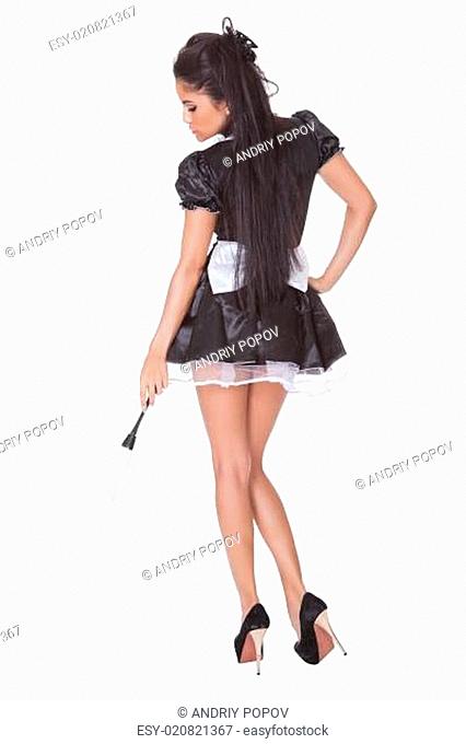 Sensual woman in skimpy maids uniform