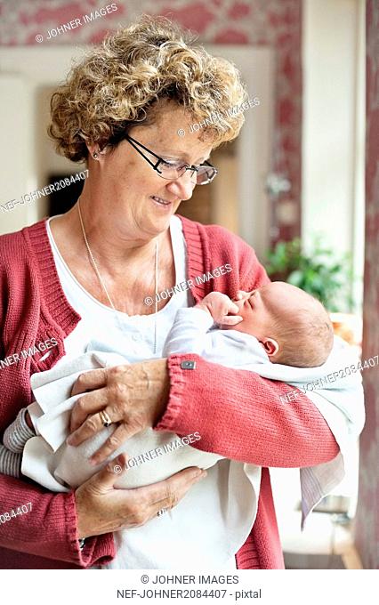Grandmother holding baby