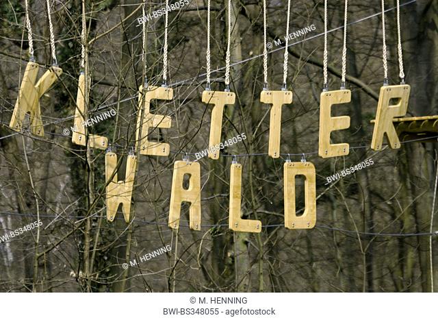 climbing park entrance, wooden letters in a forest , Germany