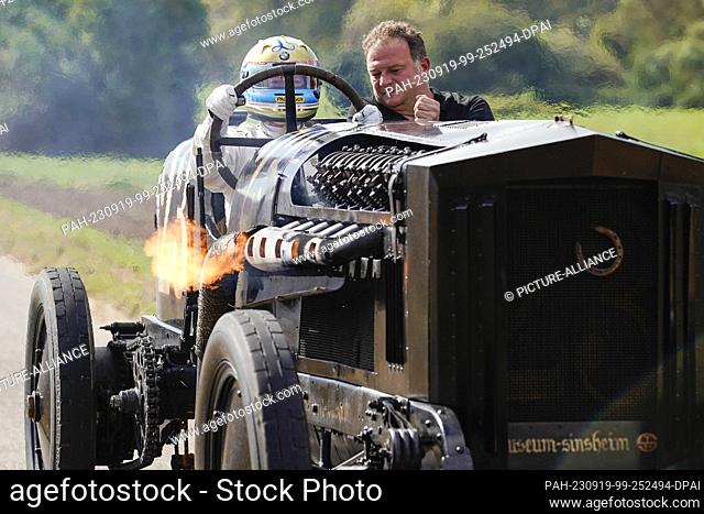19 September 2023, Baden-Württemberg, Sinsheim: Former racing driver Leopold Prince of Bavaria (l) rides in the ""Brutus"" racing car with an assistant at the...