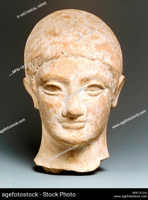 Terracotta head of a youth. Period: Early Hellenistic; Date: early 3rd century B.C. (?); Culture: Cypriot; Medium: Terracotta; mold-made; Dimensions: H