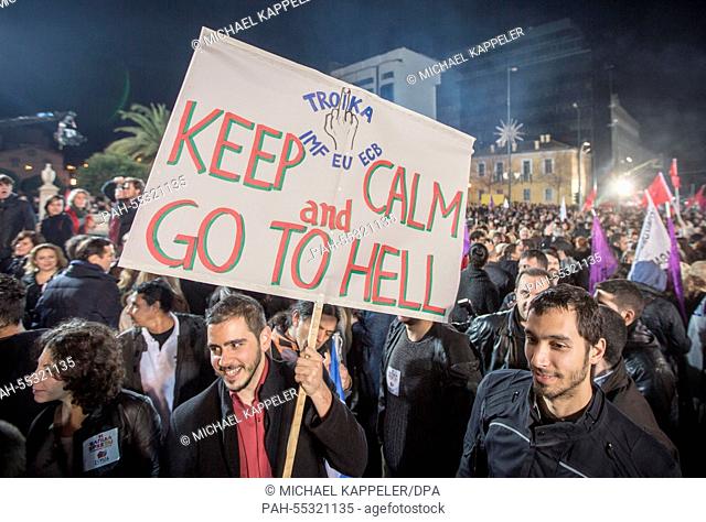 A Poster with the Slogan ""Troika- KEEP CALM AND GO TO HELL"" is seen after Alexis Tsipras leader of the radical left main opposition party Syriza held his...