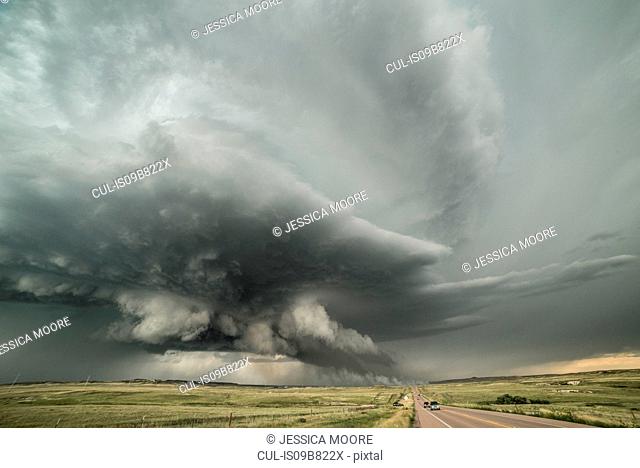 Supercell structure and a lightning, igniting grass fire, Carr, northern Colorado, USA