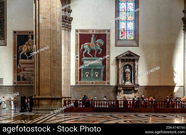 FLORENCE, ITALY - SEPTEMBER 22, 2015 : Interior view of famous Duomo in Florence, with sculptures and paintings