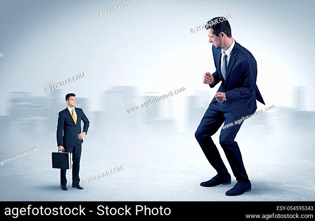 Giant businessman being afraid of small serious executor with suitcase