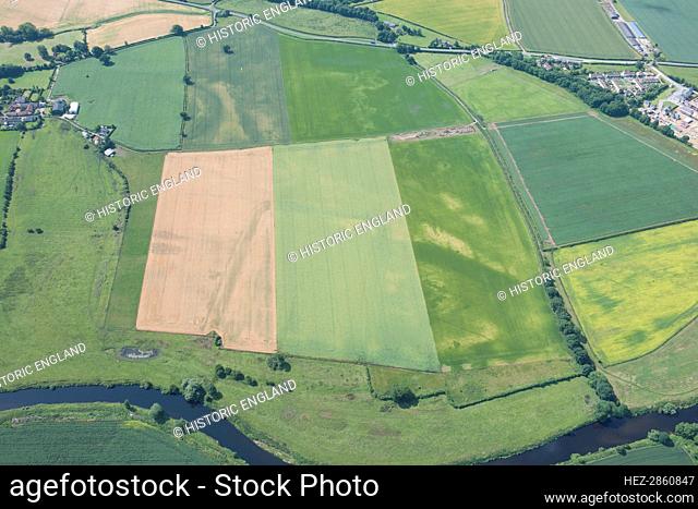 Roman fort and Neolithic henge monument west of Newton Kyme, North Yorkshire, 2015. Creator: Historic England