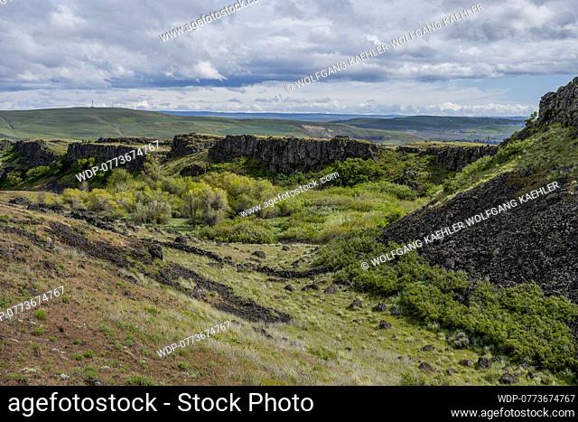 View of lava bluffs and basalt formations (volcanic formations about 40-60 million years old)from the Dalles Mountain Road near Lyle, Washington, USA