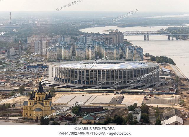 Picture of the Nizhny Novgorod Stadium with the Alexander Nevsky Cathedral in the foreground taken in Nizhny Novgorod, Russia, 26 August 2017 (aerial shot)