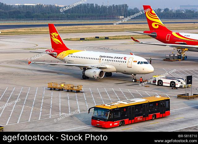 An Airbus A319 aircraft of Capital Airlines with registration number B-6182 at Beijing Airport (PEK), Beijing, China, Asia