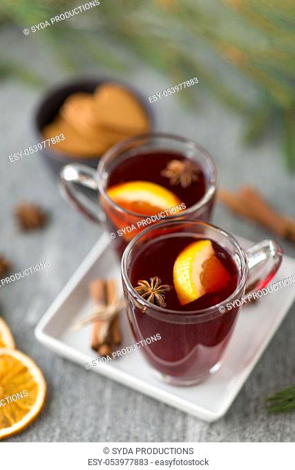 mulled wine, orange slices, gingerbread and spices