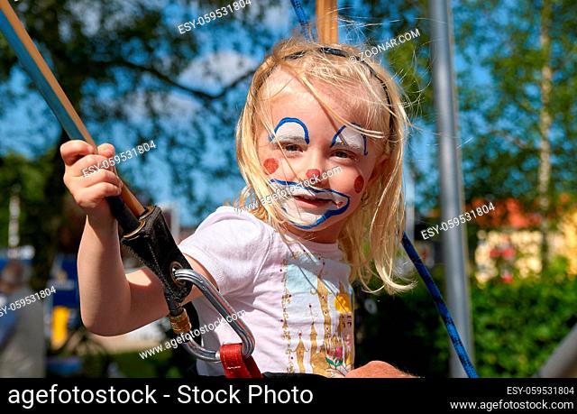 child clown jumping
