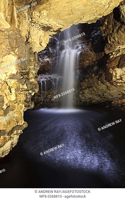 Smoo Cave Waterfall in a cave at Durness in the far North West of Scotland