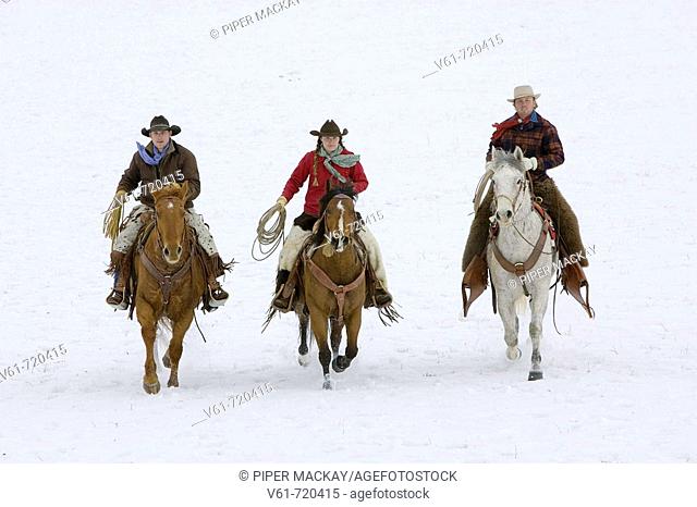 Wranglers out for a winter ride, Shell, Wyoming, Usa