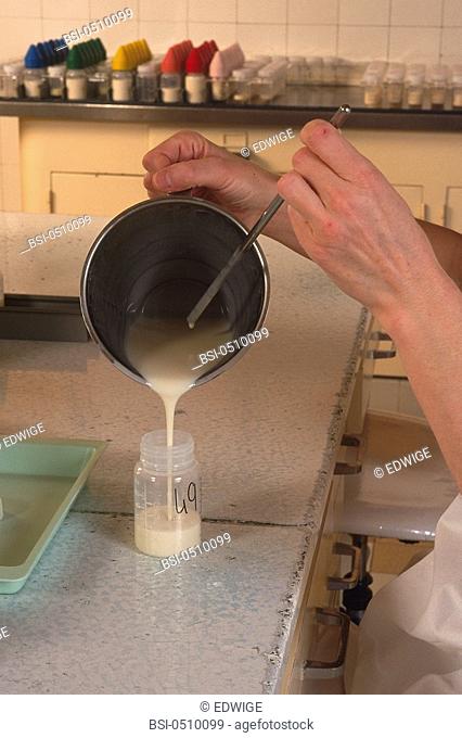 BOTTLE-FEEDING<BR>Institut de Puériculture, a prenatal and pediatric center in Paris, France. Preparing bottles from maternal milk or from powdered formula