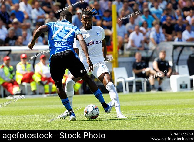 Club's Clinton Mata and Genk's Mike Tresor Ndayishimiye fight for the ball during a soccer match between Club Brugge and KRC Genk, Sunday 24 July 2022 in Brugge
