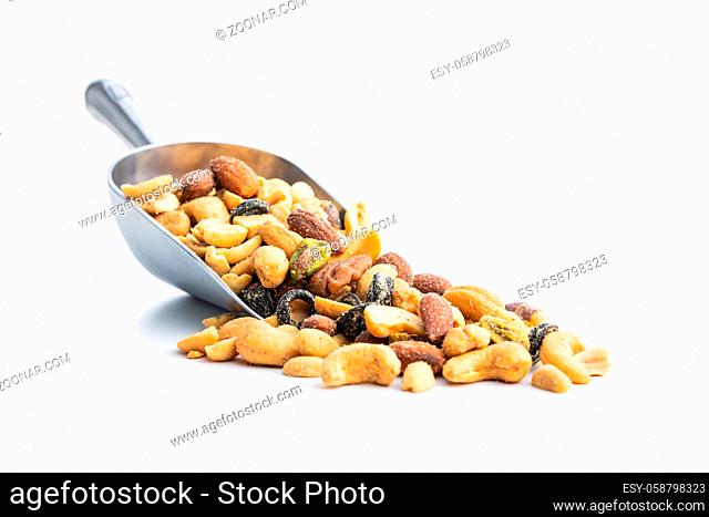 Mix of salted nuts in sccop isolated on white background