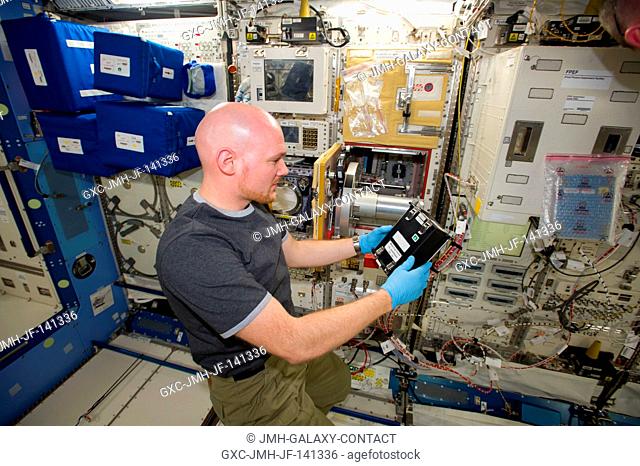 European Space Agency astronaut Alexander Gerst, Expedition 41 flight engineer, works with a measurement experiment in the Kibo laboratory of the International...