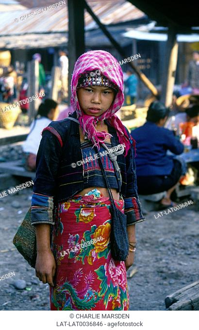 Young Akka Iko girl wearing scarf and headdress