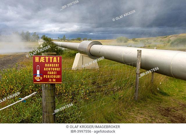 Warning sign, pipeline with boiling water for the supply of Akranes and Borgarnes, Deildartunguhver, highest-flow hot spring of Iceland with 180 liters of...