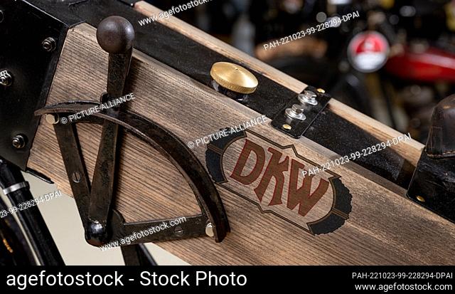 PRODUCTION - 04 October 2022, Saxony, Chemnitz: The brand name DKW is written on the wooden frame of a replica of a DKW racing motorcycle in the Museum of Saxon...