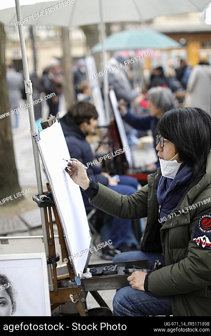Portrait painter in Montmartre, Paris