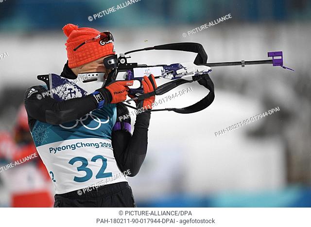 Erik Lesser of Germany in action with his rifle during the men's 10 km sprint biathlon competition at the 2018 Olympics in Pyeongchang, South Korea