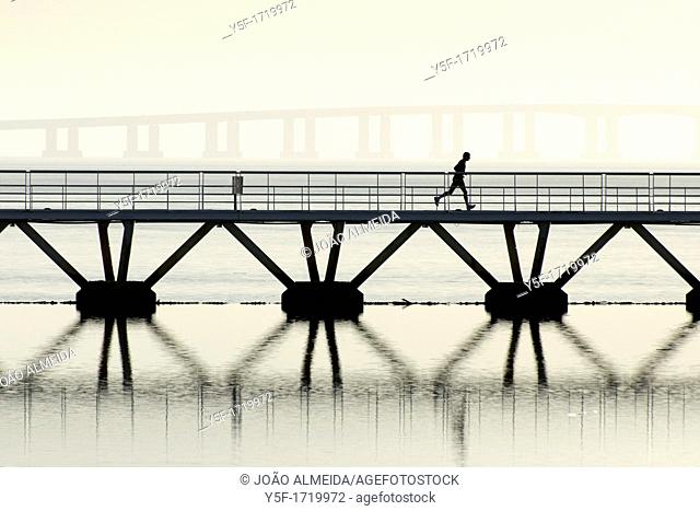 Man running at Lisbon's parque das nações
