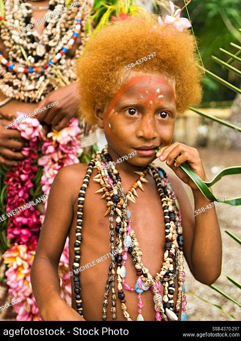 A girl at a cultural presentation by participating tribes in Tufi, Papua New Guinea. Participating clans were the Fighoya, Kandoro, Tewari, Gaboru