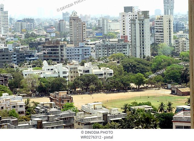 Aerial view of playground with tall multi storied buildings at Worli , Bombay Mumbai , Maharashtra , India