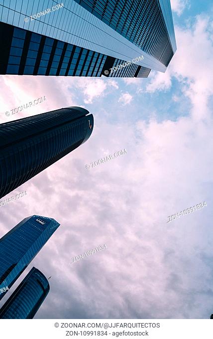 Madrid, Spain - June 25, 2017: Low angle view of skyscraper in Cuatro Torres Business Area, CTBA, Four Towers Business Area
