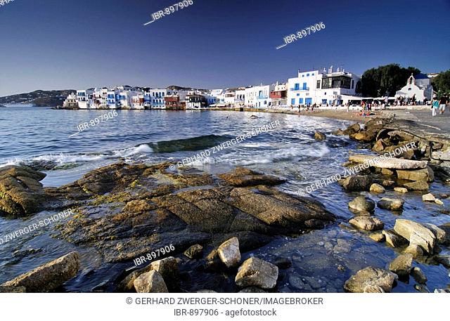 Rocky beach in front of Little Venice, Mykonos Island, Cyclades, Greece, Europe