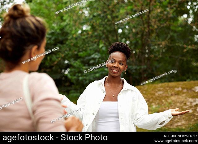 Women talking in park