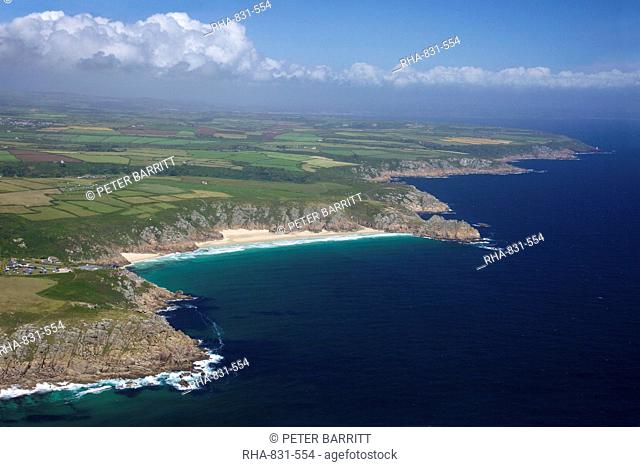 Aerial photo of Lands End Peninsula looking east to the Minnack Theatre and Porthcurno beach, Treen Cliff, Logan Rock, West Penwith, Cornwall, England